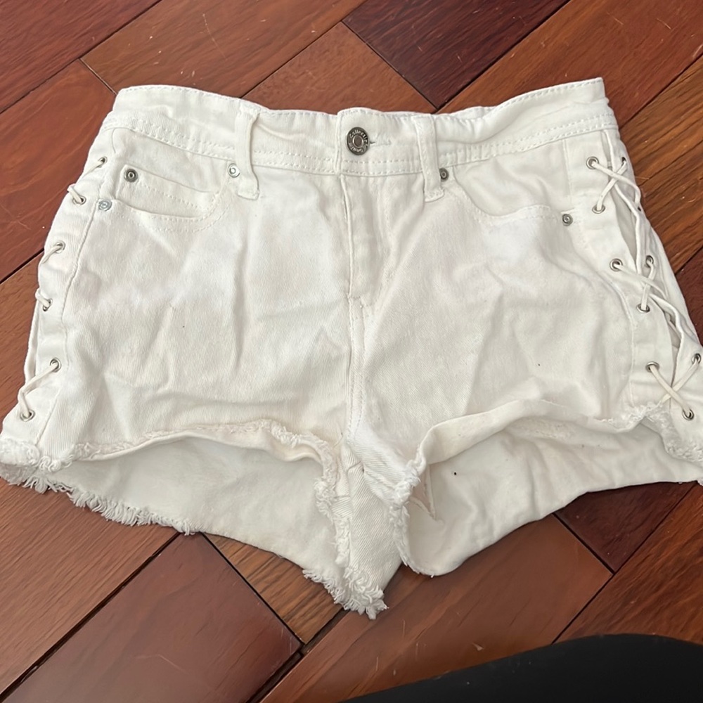 White laced up jean shorts